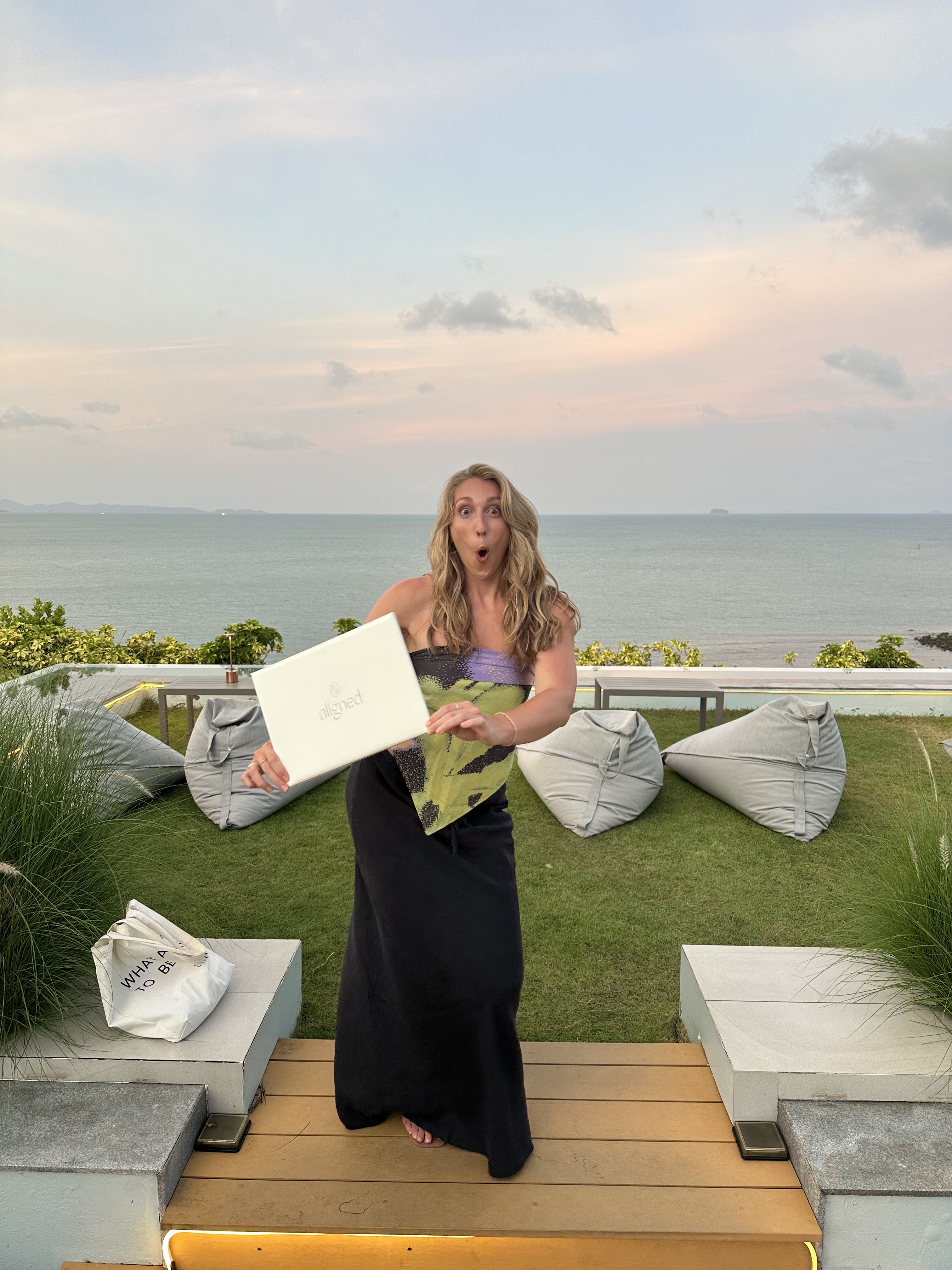 Becca Q. completing her yoga teacher training in Thailand